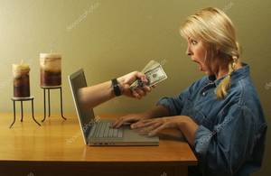 depositphotos_2345141-stock-photo-money-through-laptop-screen-and.thumb.jpg.75370b6a32edf12e48610b4753f65727.jpg