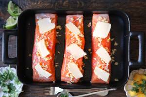 raw-salmon-fillets-with-minced-garlic-and-butter-in-a-baking-dish.thumb.jpg.0c4096190753b25db44688e81ab9c3eb.jpg