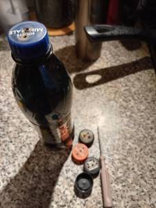 Бутылка с дырявой крышкой.jpg